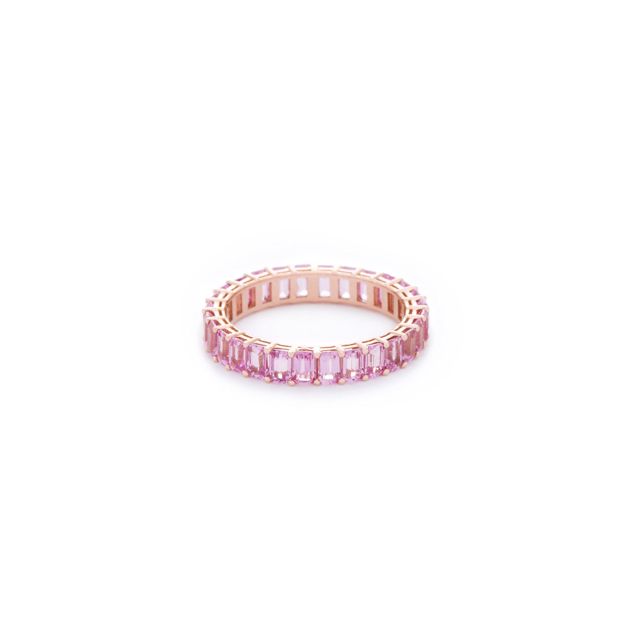 Pink emerald cut sapphire ring. Handcrafted in Australia from with custom cut petite size natural sapphires with 18K gold band. All stones individually assessed by certified gemologist.
