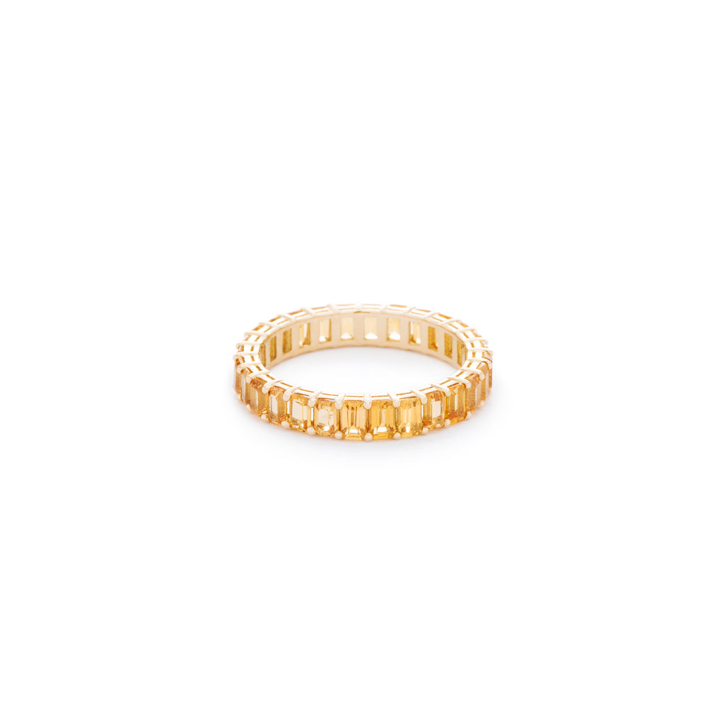 Yellow emerald cut sapphire ring. Handcrafted in Australia from with custom cut petite size natural sapphires with 18K gold band. All stones individually assessed by certified gemologist looking to create high quality jewellery pieces. 