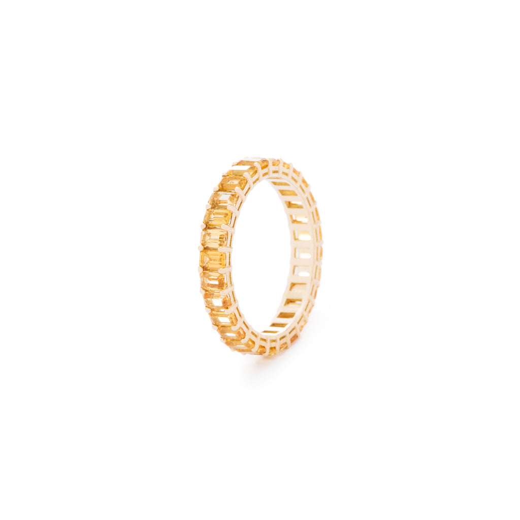 Yellow emerald cut sapphire ring. Handcrafted in Australia from with custom cut petite size natural sapphires with 18K gold band. All stones individually assessed by certified gemologist.