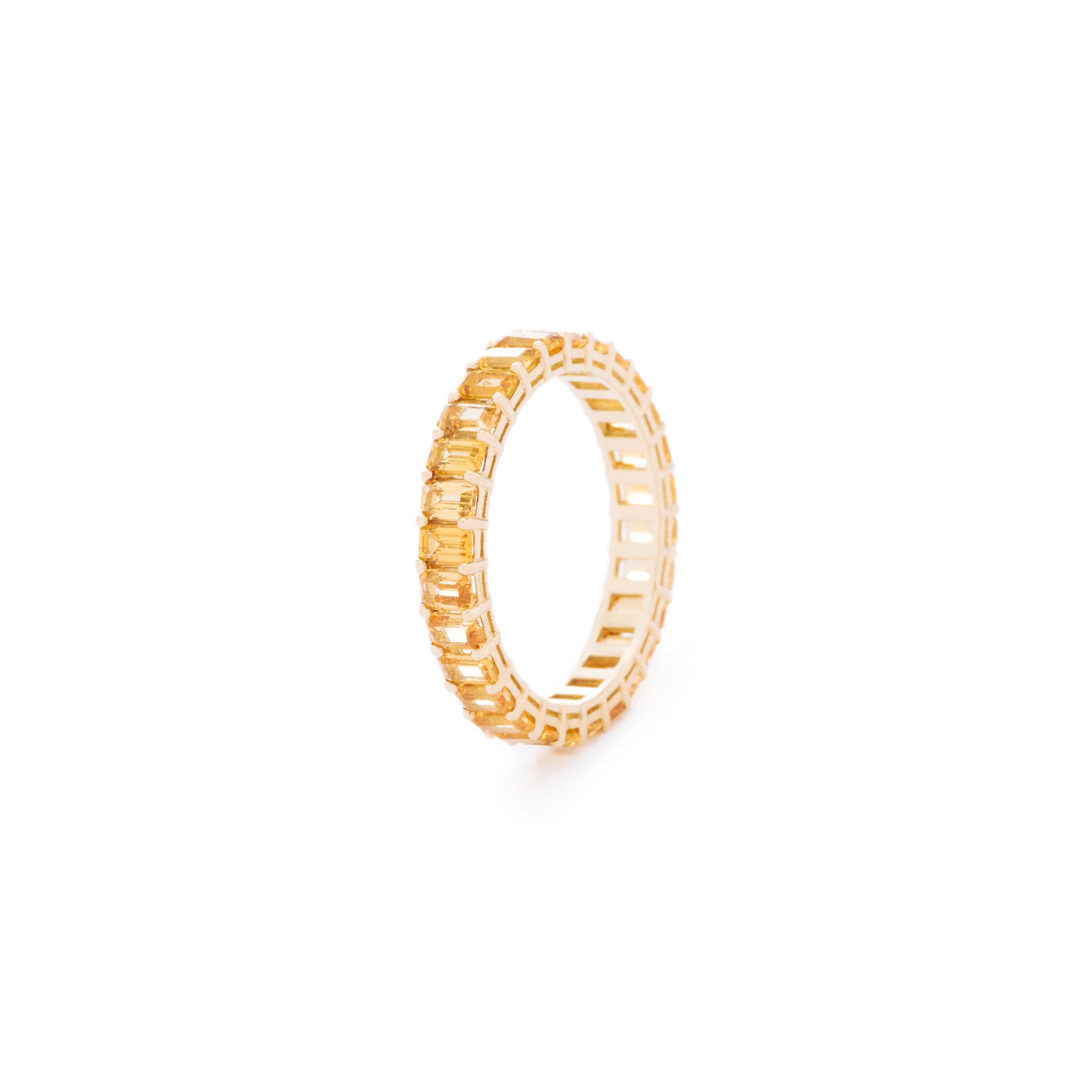 Yellow emerald cut sapphire ring. Handcrafted in Australia from with custom cut petite size natural sapphires with 18K gold band. All stones individually assessed by certified gemologist.