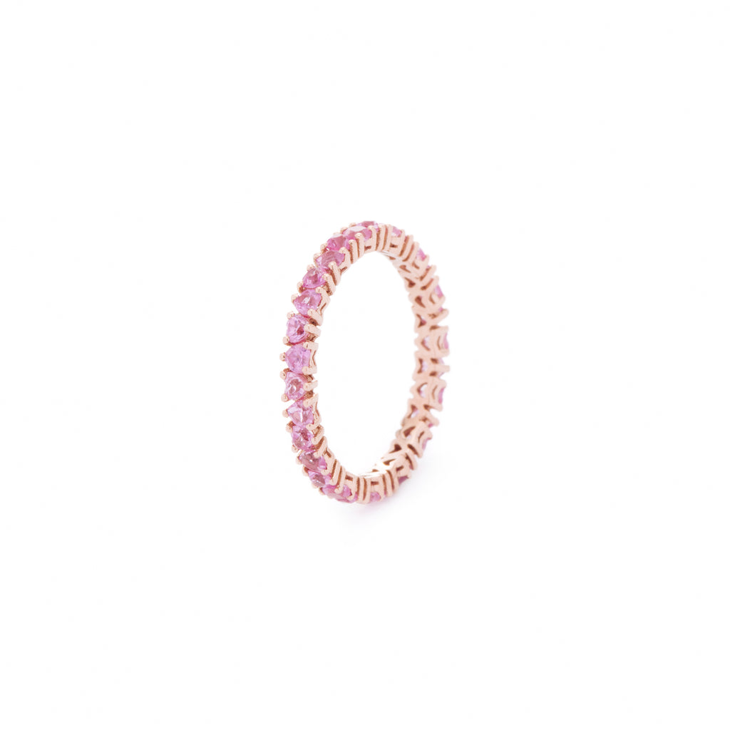Pink natural sapphires, custom cut to petite size, set in 18K gold band. Handcrafted in Australia, this piece is the epitome of simple everyday luxury jewellery.