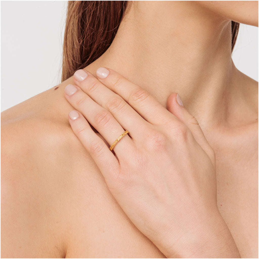 Yellow heart shaped natural sapphires cut in custom petite size. Set in 18k gold custom designed castings. Perfect for stacking or as a stand alone statement piece. 