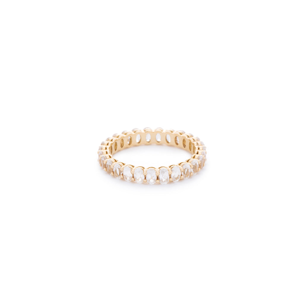 Oval white sapphire ring. Handcrafted in Australia from with custom cut petite size natural sapphires with 18K gold band. All stones individually assessed by certified gemologist.