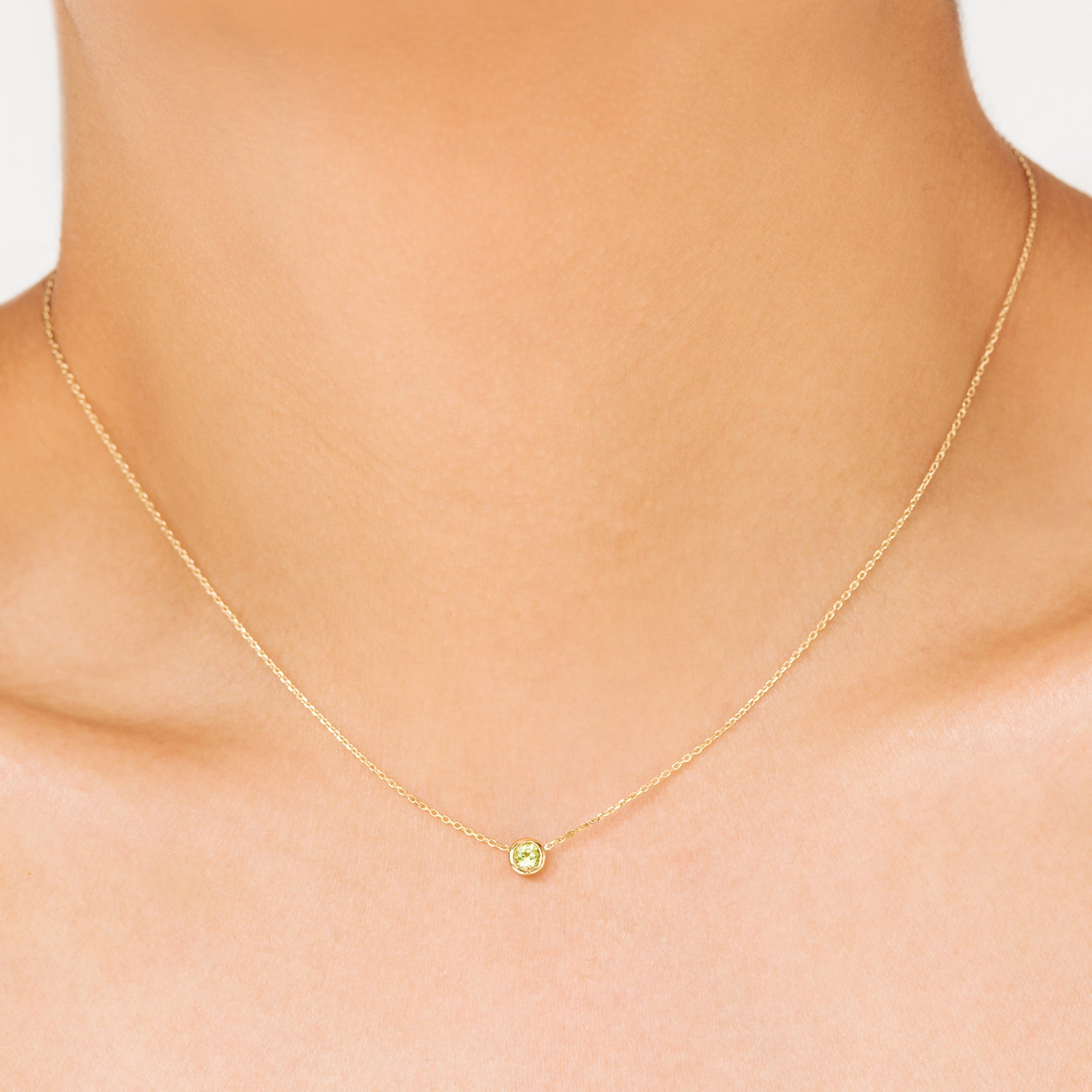 Classic 'yellow-green' variety, Peridot is the birthstone necklace celebrating August.  Consisting of 18k gold chain with extenders to personalise length of necklace/choker. Perfect as an anniversary, birthday or special occasion jewellery present.