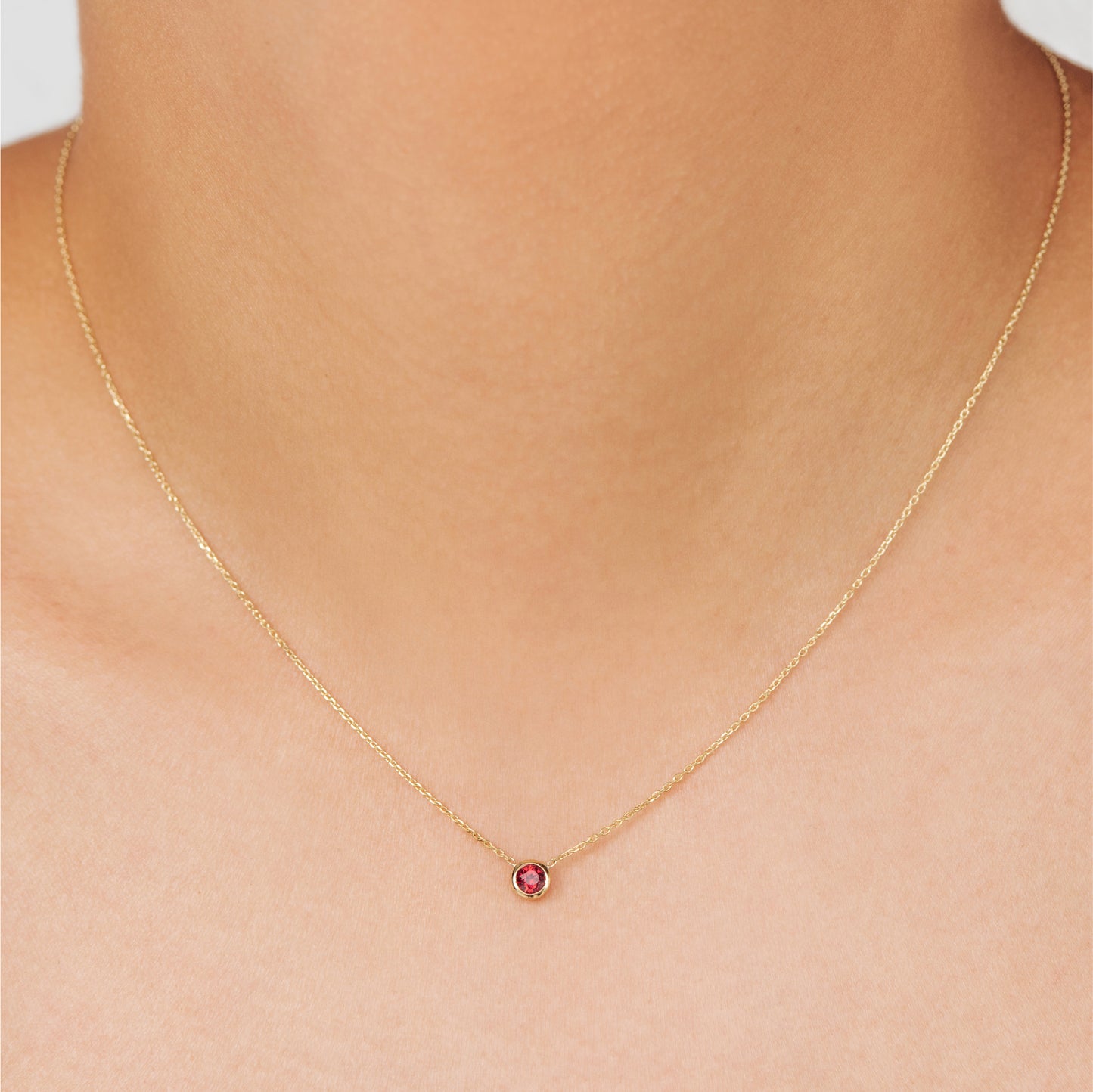 Classic red variety Ruby necklace, celebrating the month of October. Consisting of 18k gold chain with extenders to personalise length of necklace/choker. Perfect as an anniversary, birthday or special occasion jewellery present.