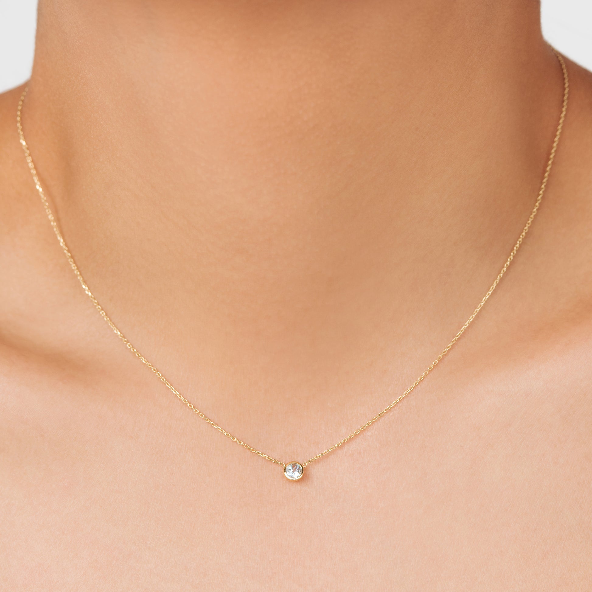 Pale teal blue Aquamarine pendant celebrating the month of March on an 18k gold chain. Handcrafted in Australia as a perfect jewellery gift for an upcoming anniversary or birthday. A perfect statement piece on its own as a choker or layered in a stack. 