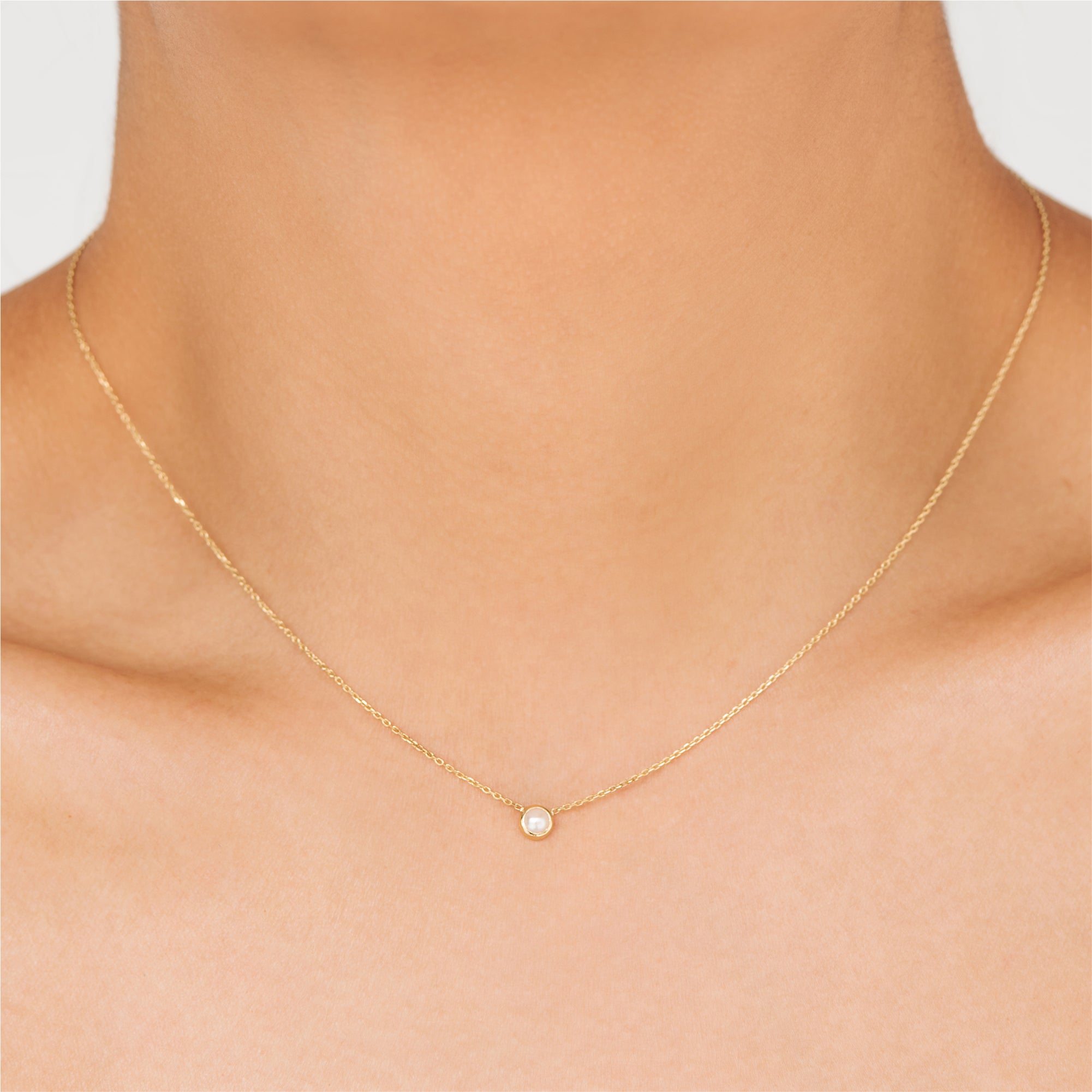 Classic pendant celebrating the month of June. This pearl stone floating on an 18k lace gold chain. Handcrafted in Australia as a perfect jewellery gift for an upcoming anniversary or birthday. A perfect statement piece on its own as a choker or layered in a stack. 